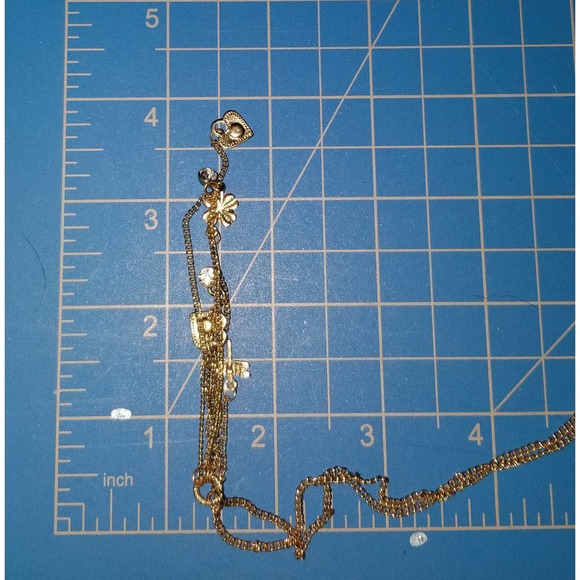 Gold Tone Lariat Necklace with Dangling Charms Hearts, Dragonfly & 4 Leaf Clover - Picture 7 of 7